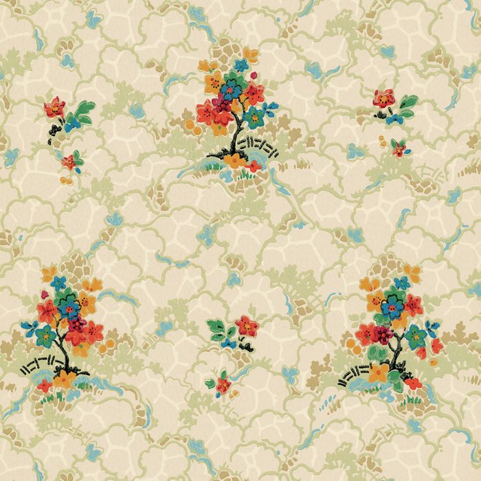 Pollyanna vintage wallpaper showcases clusters of vibrant red, orange, blue, and yellow florals on a beige background with green and blue accents—ideal for set design.